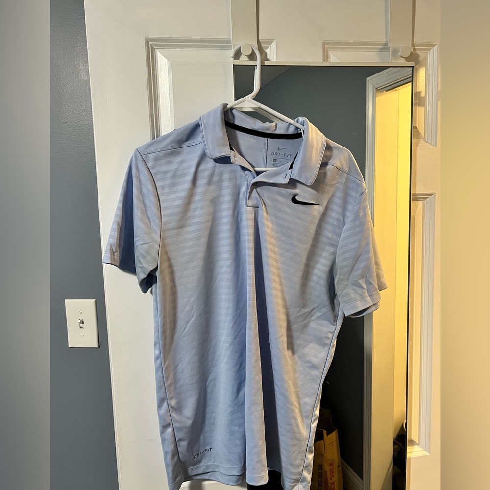 Light blue Nike men’s golf shirt